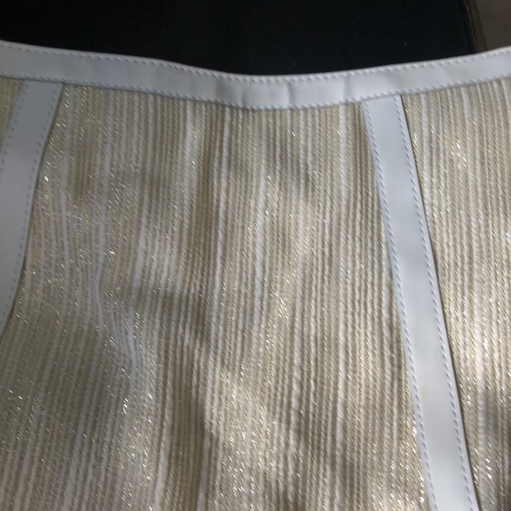 Cream and gold color purse